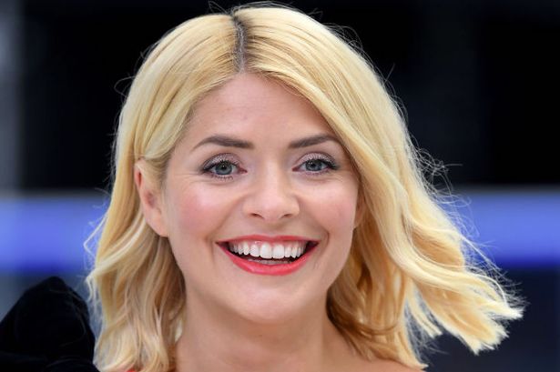 Holly Willoughby in a stunning £55 Marks and Spencer jumpsuit has fans comparing her to a famous rock star