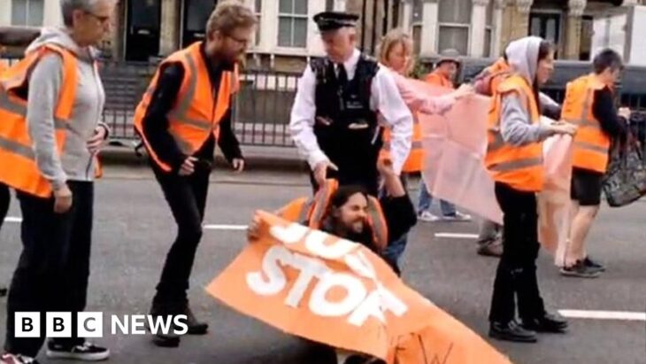 Met Police officer drags Just Stop Oil protester along road