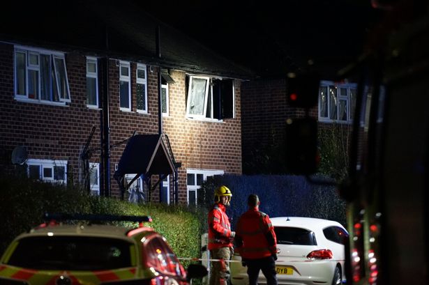 Woman taken to hospital after house fire sees emergency services flood street
