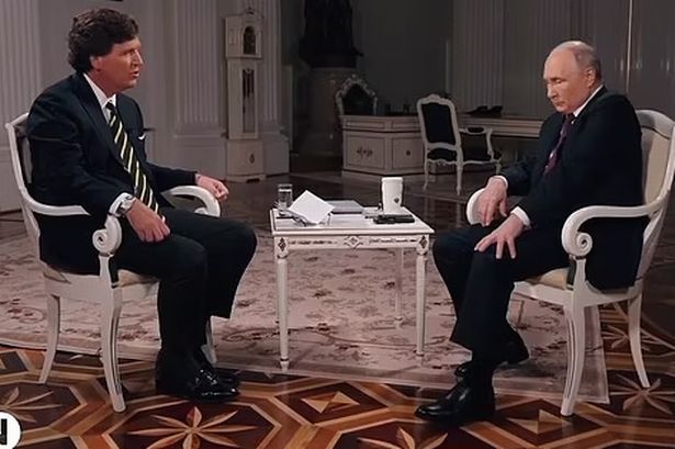 Vladimir Putin forced to hold down shaking leg in Tucker Carlson chat amid health rumours