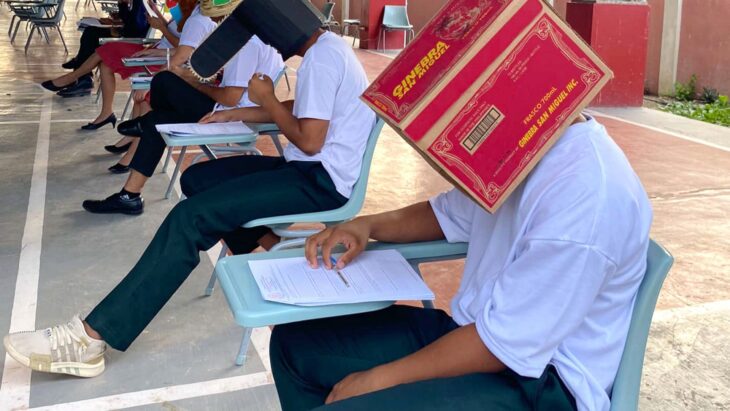 Agriculture students asked to wear bizarrely-shaped giant hats by university to stop them from cheating in exams