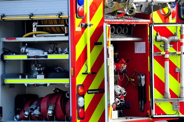North Wales Fire Service tell locals to 'shut all windows and doors' as black smoke fills area
