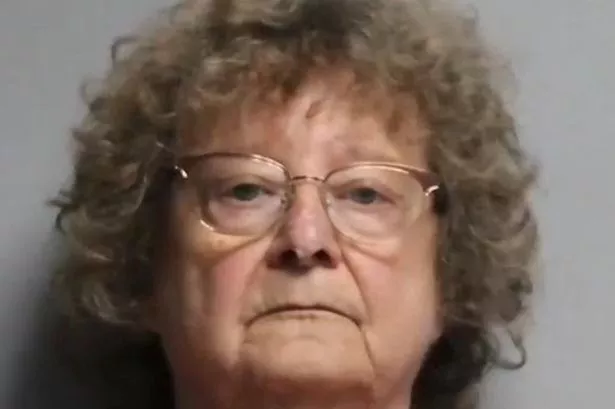 Gun-toting gran, 74, pictured robbing bank after 'losing all money in an online scam'