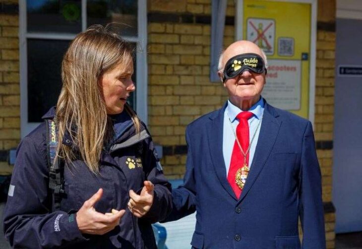 Maidstone Mayor Gordon Newton blindfolded for train journey in Guide Dogs awareness event