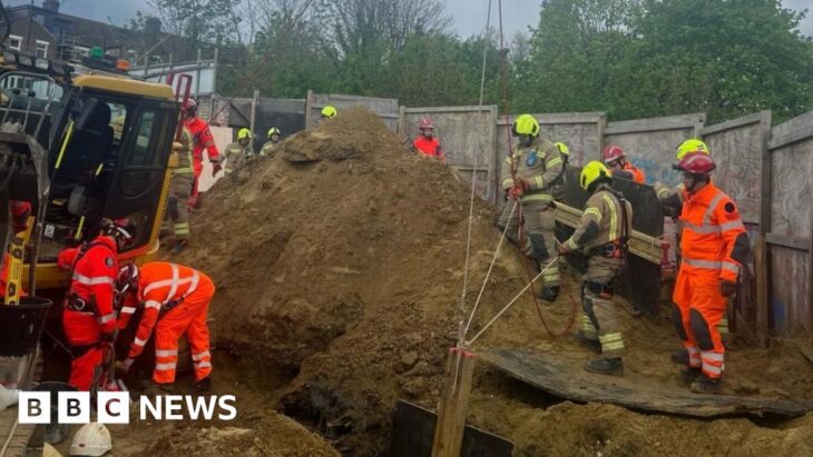 Man rescued after being buried in clay and sand