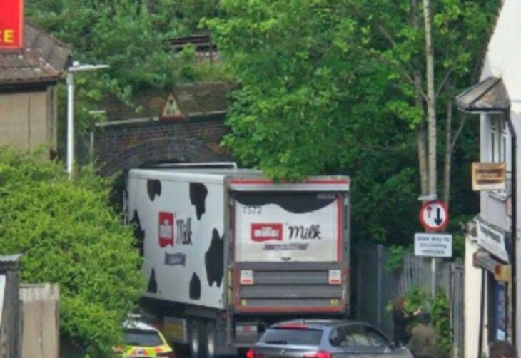 Muller Milk lorry stuck under railway bridge in Otway Terrace, Chatham
