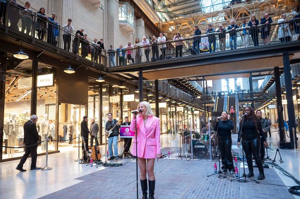 Pixie Lott plays surprise Battersea Power Station gig as she belts out new songs - in photos