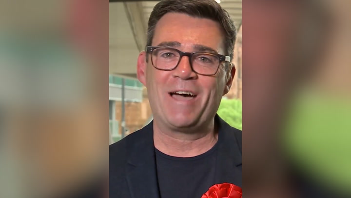 Andy Burnham asks Manchester residents to ‘buy him a pint’ as he celebrates re-election