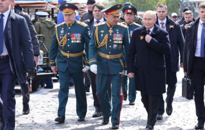 Putin’s dreaded 'nuclear briefcase' spotted at Victory Day parade…but TV coverage HACKED to show destroyed Russian tanks